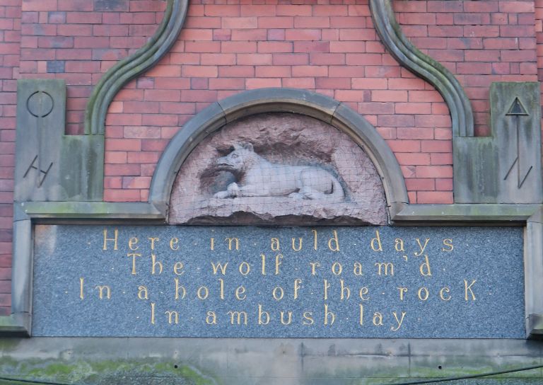 Wolf carving on the Wolf Craig Building